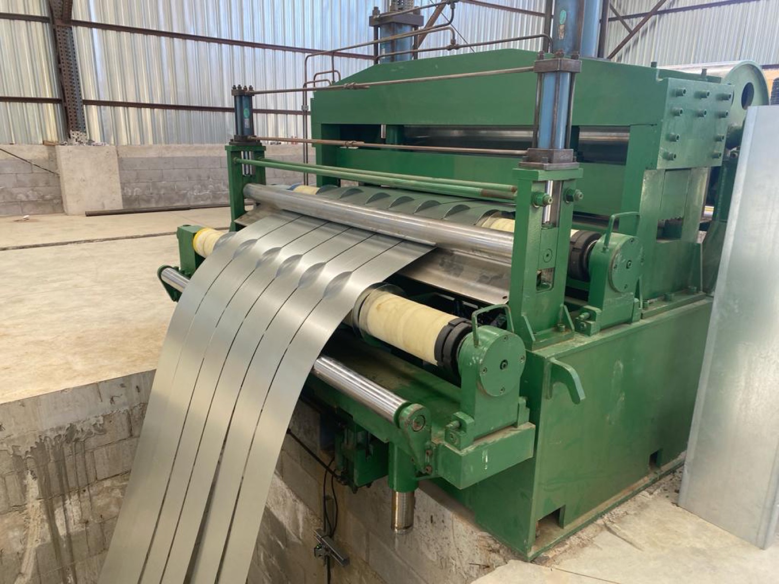 Roll-forming and fabrication equipment at the Cal Steel facility.