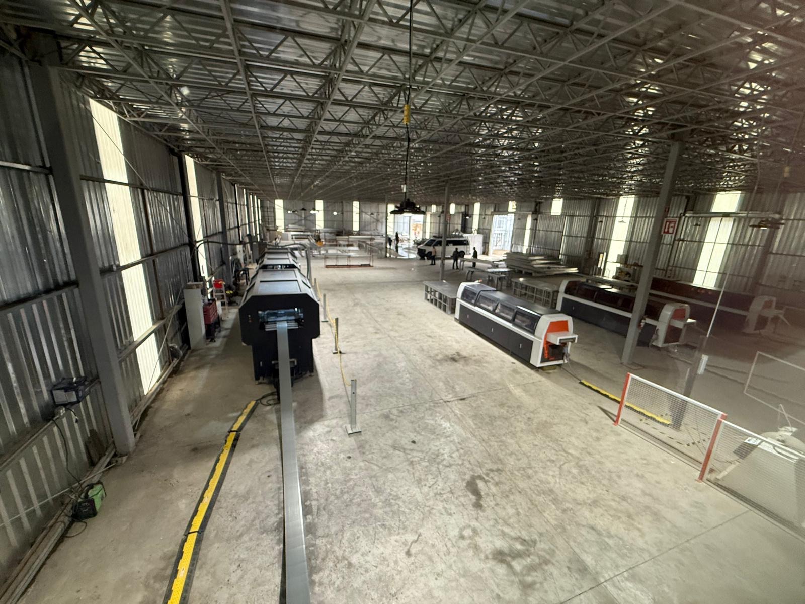 Roll-forming and fabrication equipment at the Cal Steel facility.