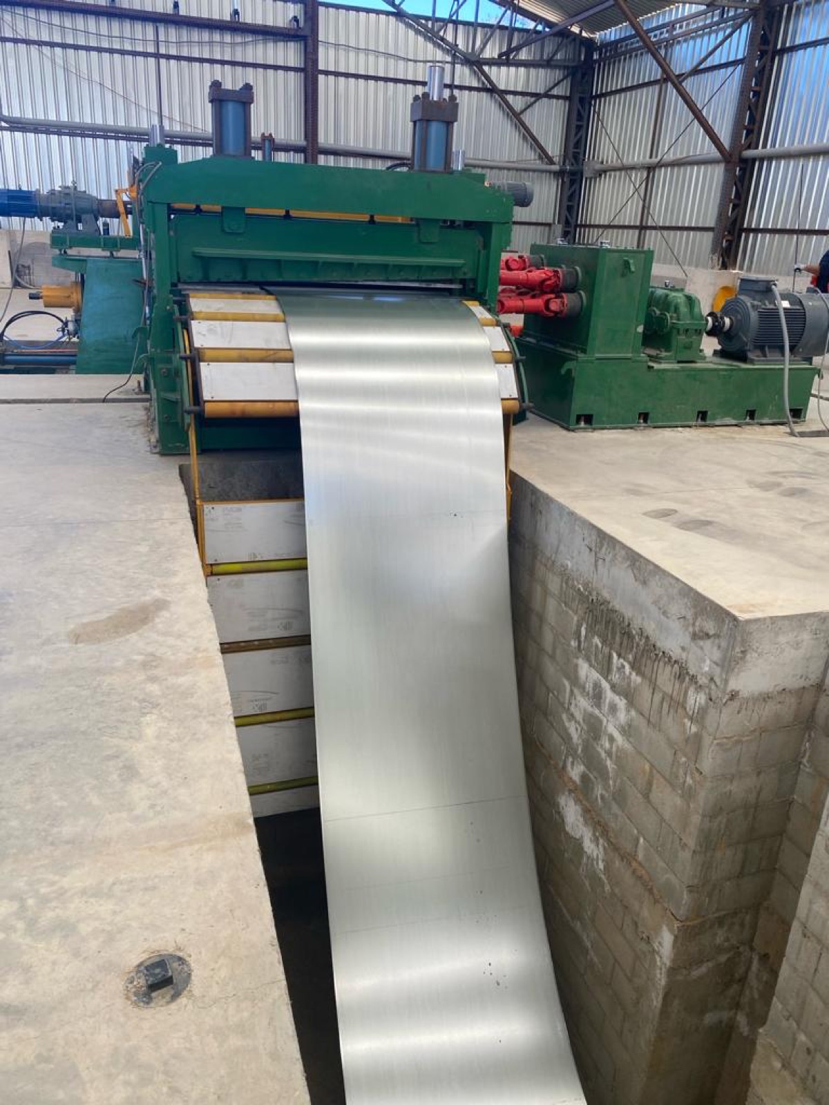 Roll-forming and fabrication equipment at the Cal Steel facility.
