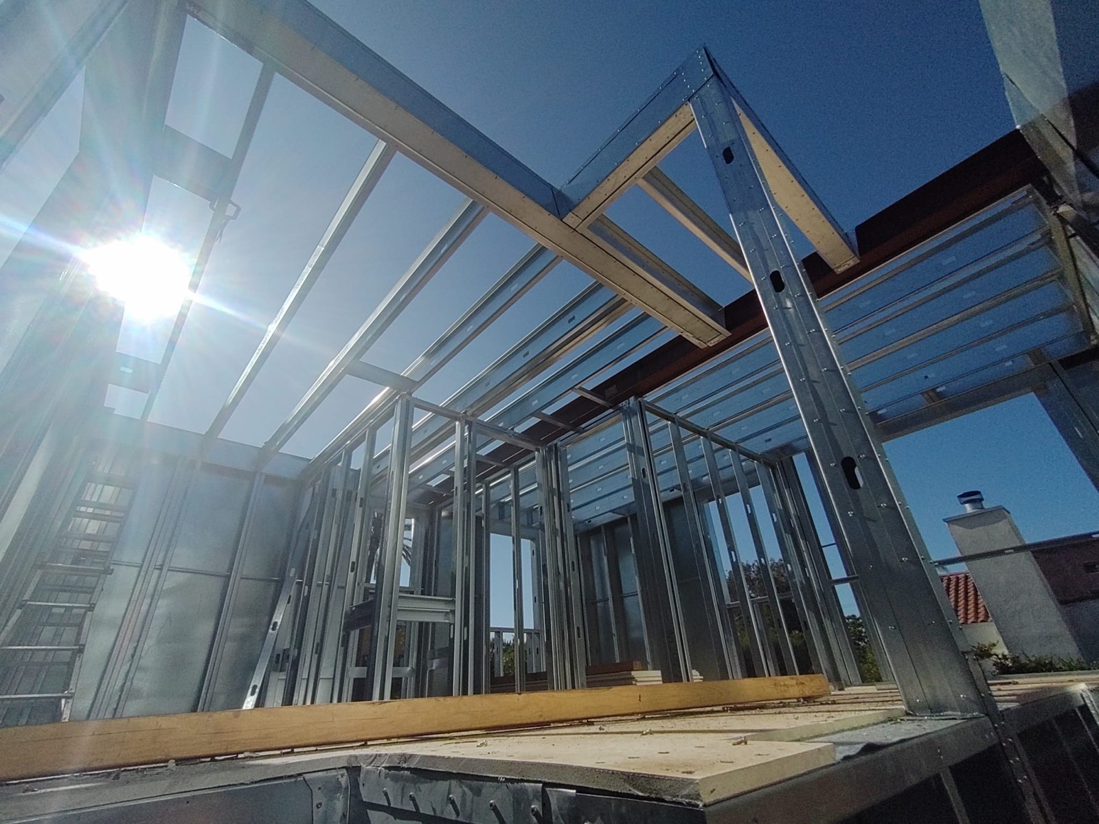 Light gauge steel wall framing with window openings at 823 North June Street