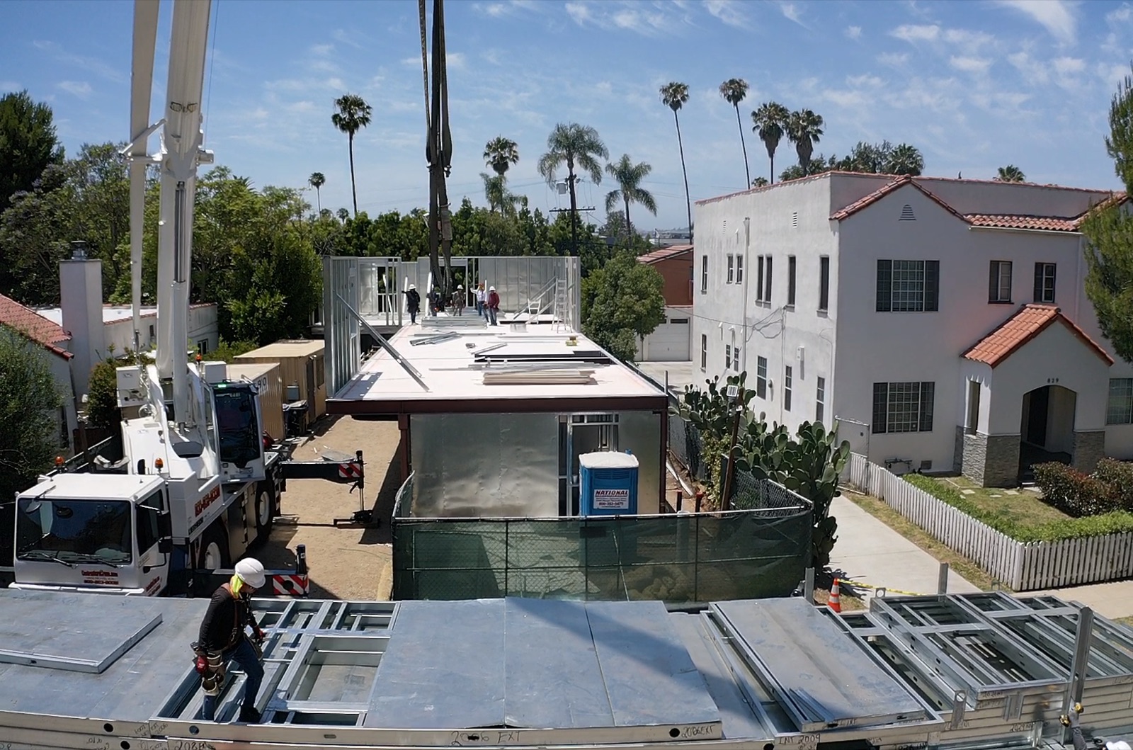 The structural steel garage level carrying the light gauge steel floors above at 823 North June Street