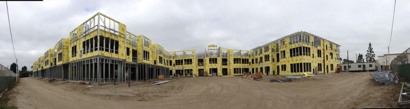 Panorama of the Merrill Gardens Huntington Beach senior living facility under construction.